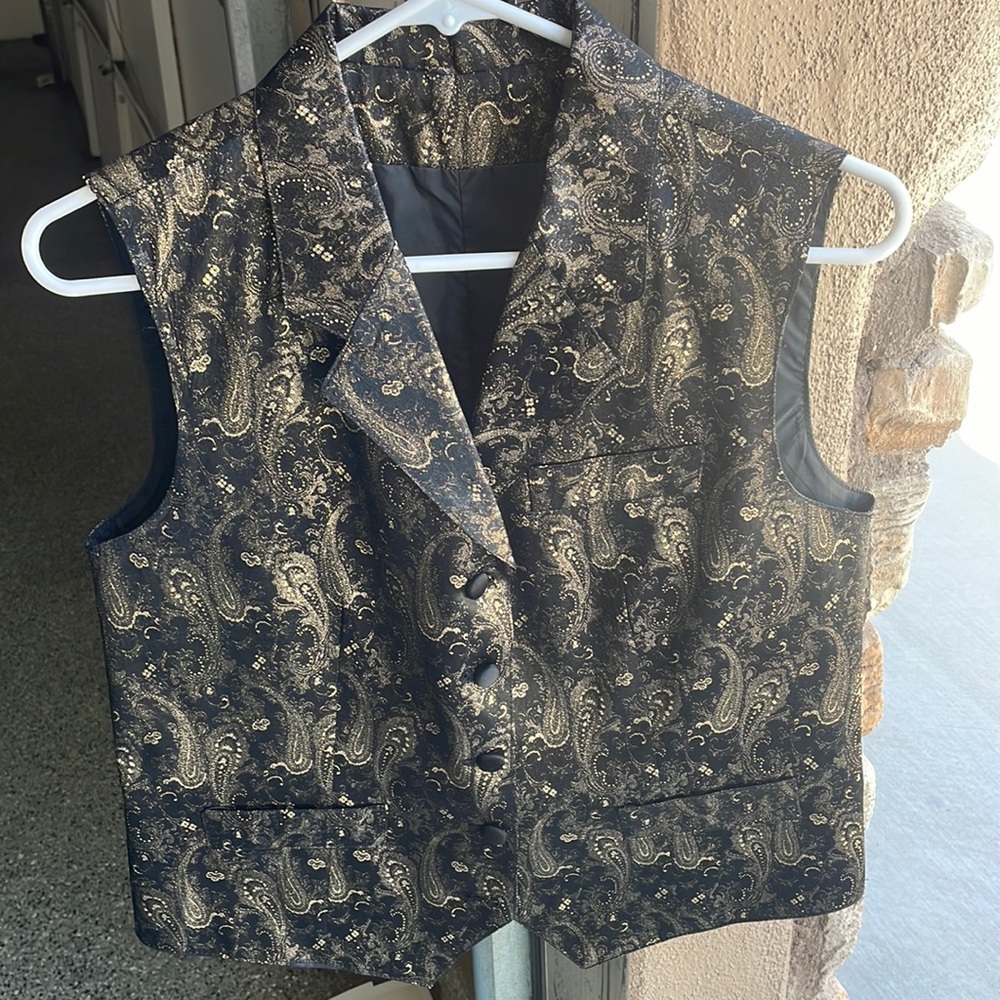 NWOT Black and gold “Lord West”size small vest. NWOT two dummy pockets